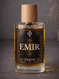 Perfume bottle labeled 'EMIR PAROS' with a dark label and wooden cap on a gray background